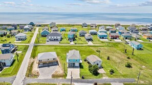 The beach house is very close to the beach. Just a short stroll to the private golf cart path.