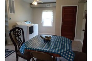 Dining area - table has 2 leafs that can be added (they're in the closet there).