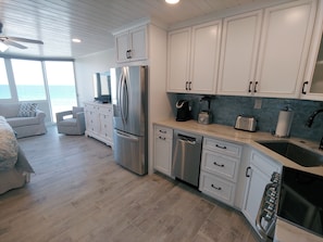 View of the kitchen and living area.