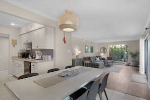 The open concept living and dining room provide a spacious feel.