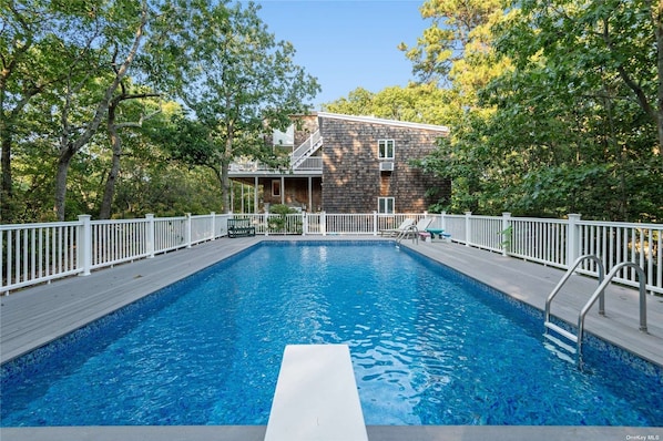 Beautiful heated pool with diving board