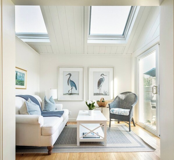 Sunroom with access to the backyard.