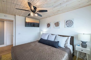 First bedroom on the main level w/ Smart TV