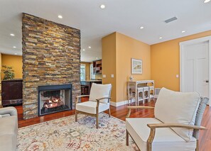 The cozy fireplace is great to lounge around and creates a beautiful atmosphere for relaxation.