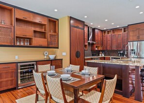 This luxurious and inviting kitchen and dining area is a dream!