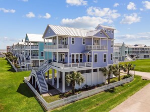 Welcome to The Purple Sandcastle! 
Steps from the beach with 5 balconies.