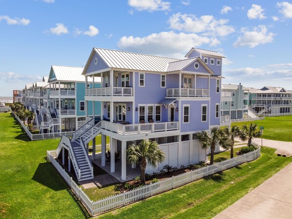Welcome to The Purple Sandcastle! 
Steps from a private beach! .