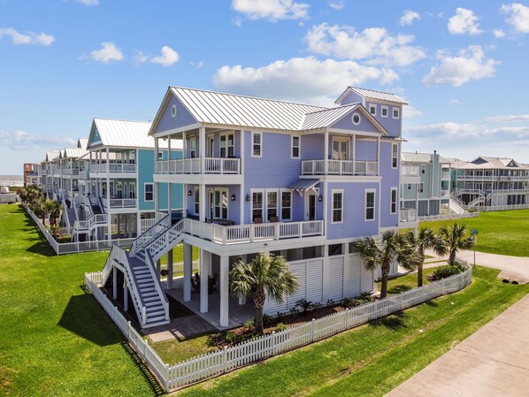 Welcome to The Purple Sandcastle! 
Steps from the beach with 5 balconies.