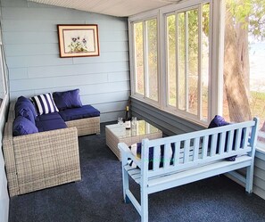 Outdoor enclosed porch. - Outdoor enclosed porch.