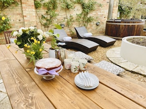 Courtyard garden with hot tub, BBQ, sunloungers