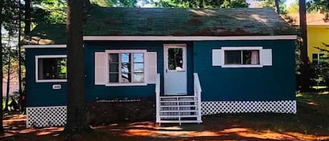 Tree lined lot with ample parking.