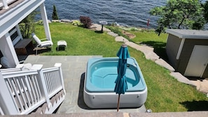 Relax in your own private hot tub while gazing out over Lake Champlain.