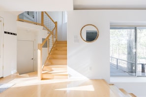 Stairway near entry up to master bedroom.