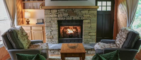 Fireplace seating area in living room 