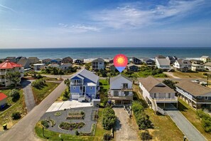 Aerial view of home looking South with beach access nearby