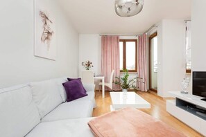 Unwind on the comfortable sofa in a pleasant atmosphere.