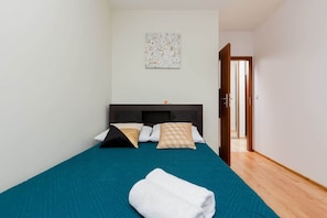 The cosy bedroom features a luxurious double bed.