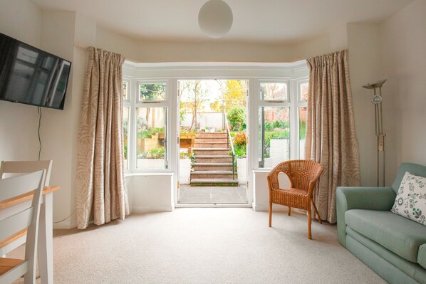 Lounge looking into full enclosed garden