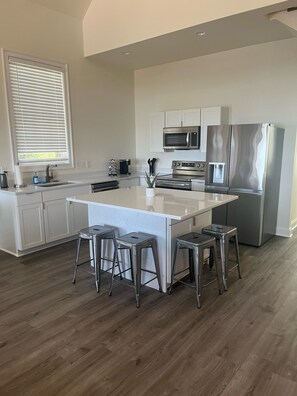 Large kitchen with all new appliances opens to living room!