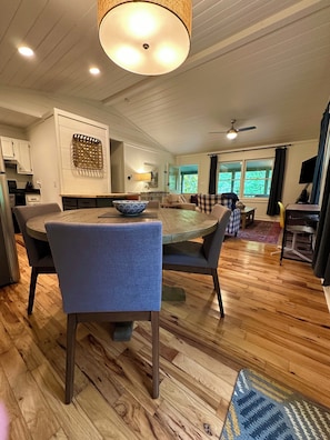 Dining area, laptop workspace, and living room