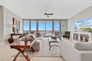 Floor to ceiling windows in the living area.