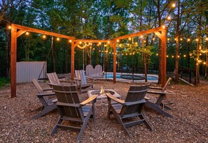 Surround yourself with the warmth of a fire pit, good company, and a sky full of stars.
