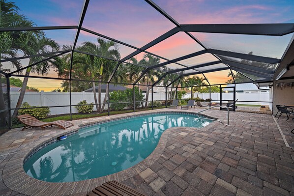 Welcome to Just Beachy- Your own private backyard oasis with a heated pool (seasonally), fire pit, lounge area, and more!