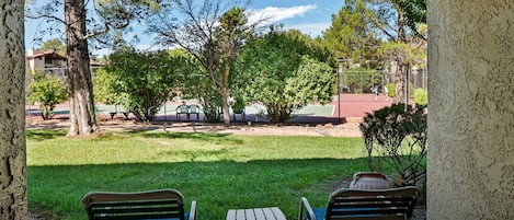 Private patio with tennis court views