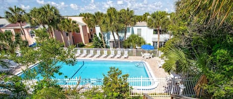 The complex pool is located just behind the unit and adjacent to beach access.