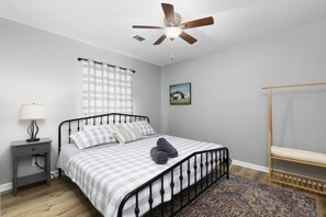 Guest bedroom #1 with a king size bed. 