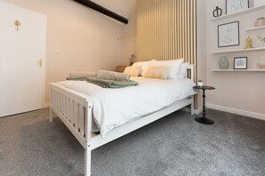 Modern double bedroom & comfy deep bed.