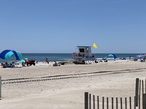 Beautiful wide beach with lifeguards just behind the water tower. 6 minute walk 