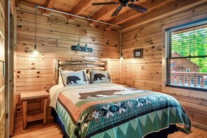 Main level - Master bedroom with King size bed and in suite bathroom.