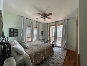 Main Level Bedroom (queen size bed) access to the screen porch/deck.