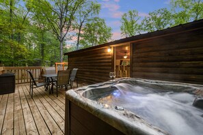 Relax in the hot tub while enjoying the forest. 