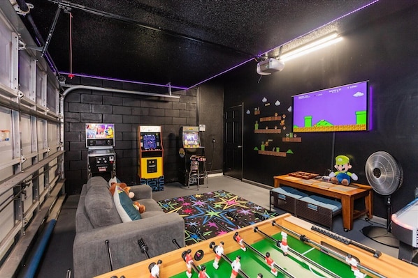 Kick butt game room so you can let your kids play while you rest