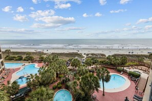 Cool off in style at our tropical oceanfront pool deck! Enjoy three outdoor pools (seasonally heated), a kiddie pool with fountain, large spacious 8.5 foot-deep pool  and a 350-foot lazy river. Lounge chairs with oceanfront views make it the perfect spot 