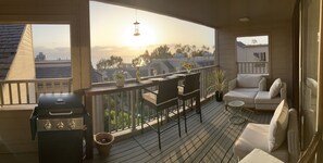 Panoramic view of the balcony with ocean view at sunset