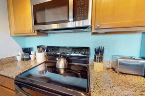 Fully Equipped Kitchen with Granite Counter Tops