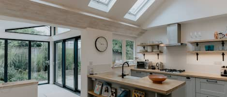 Light bright spacious open plan kitchen dining