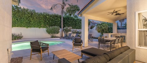 Outdoor Seating w/ Pool & Dining Area in Background