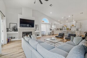 Living Area w/ Kitchen in Background