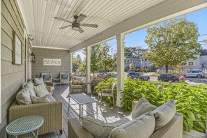 Enjoy the Golden Hour with Your Favorite Brew on You Are My Sunshine`s Covered Outdoor Patio