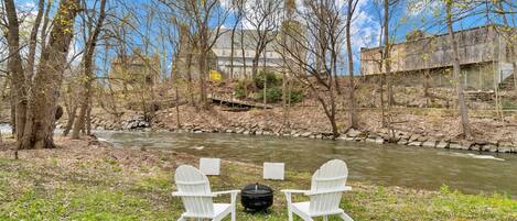 Enjoy a fire in our riverfront fire pit