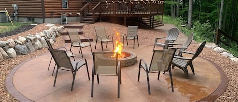 Outdoor firepit patio overlooking the Betsie River 