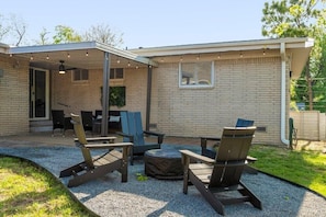 Spacious backyard w/ Lots of Seating,  A Grill & Loads of Memory Making Potential