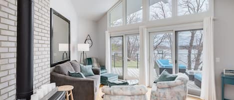 
Main level living room, amazing views of the lake with patio doors to the deck