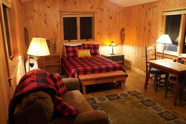 Spacious master bedroom with desk.