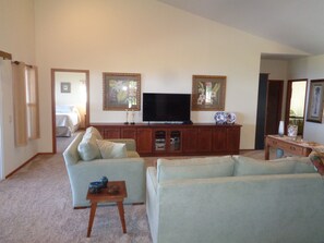 Spacious living room with vaulted ceilings