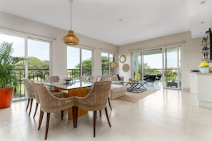 The dining and living areas, with georgeous furnishings, set the scene for making memories with family and friends.